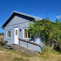 Cottage on an ecological farm with animals.