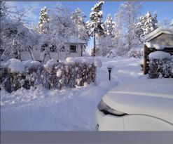 Cottage by the lake and forest with winter cozines